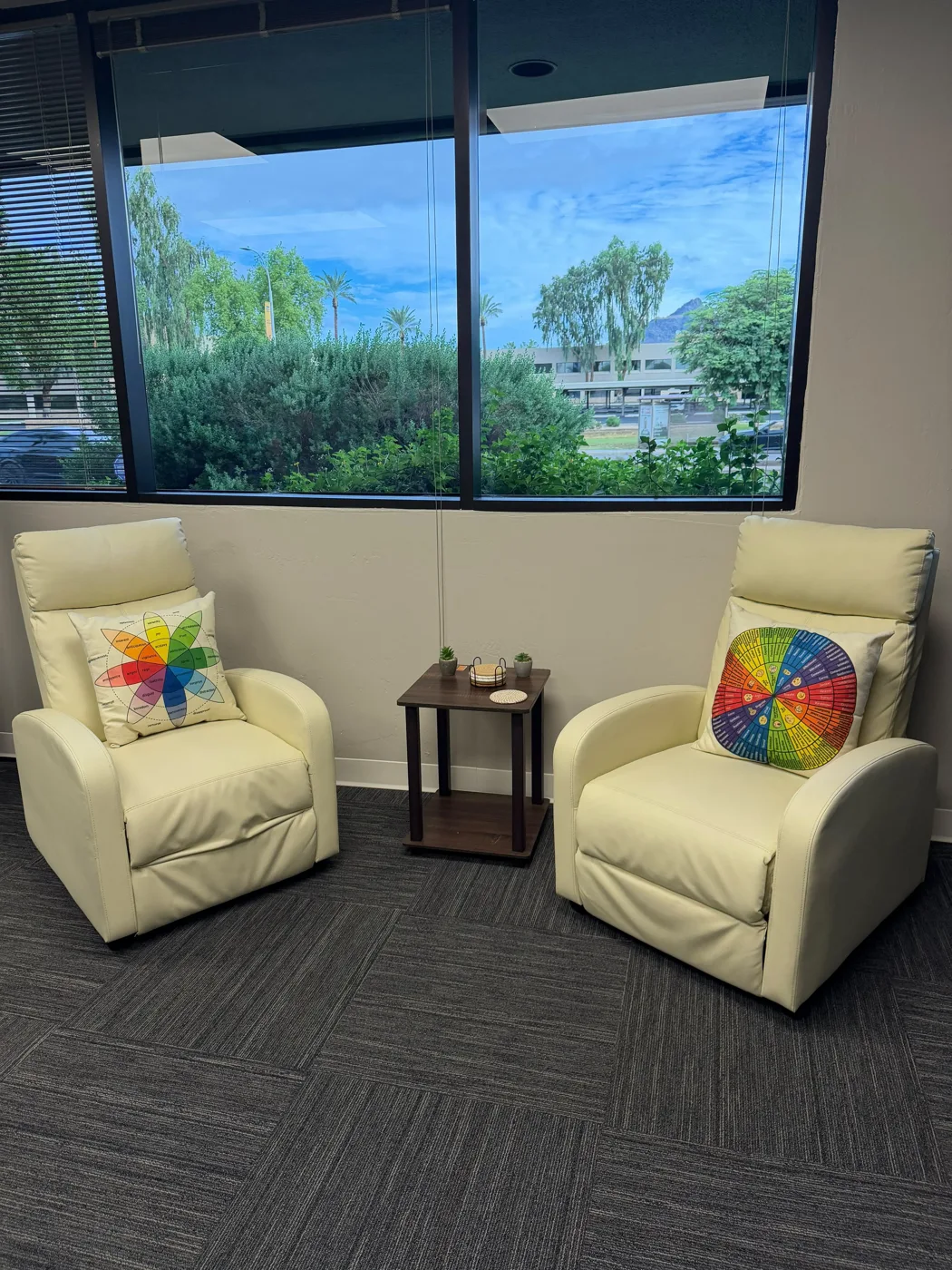 Two armchairs beside a window at our Phoenix office